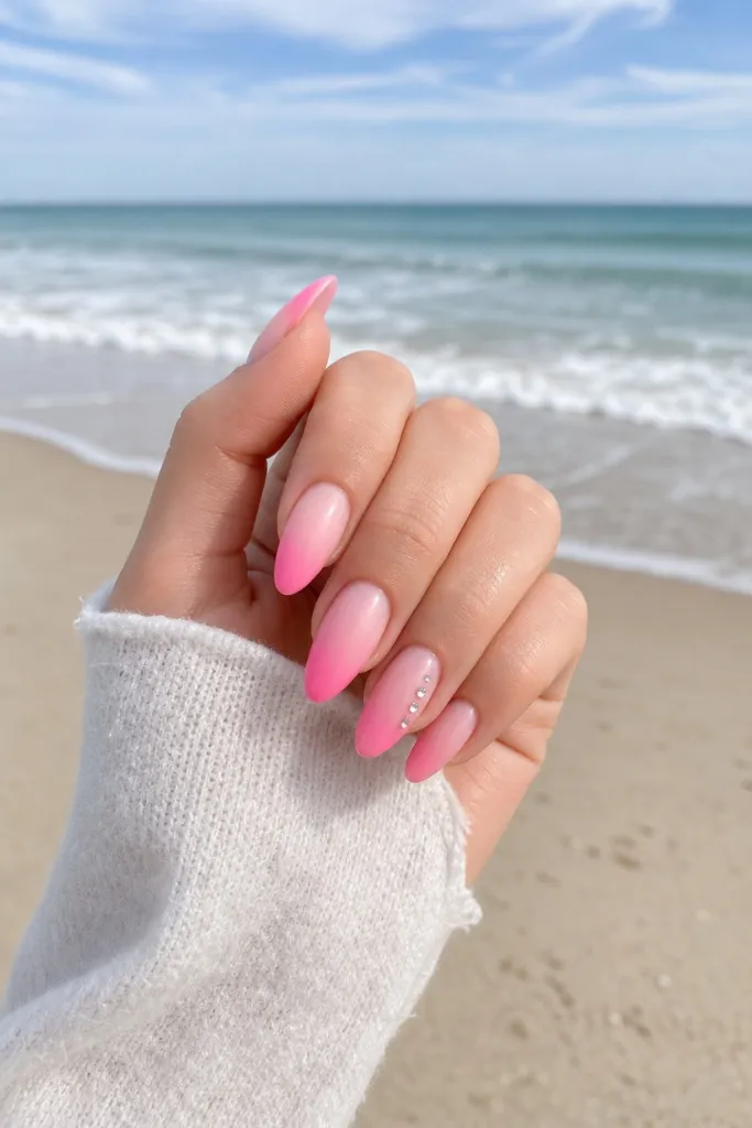 Summer Beach Nails 2026 Pink Ombré Almond Nails With Rhinestone Detail for Beach Days