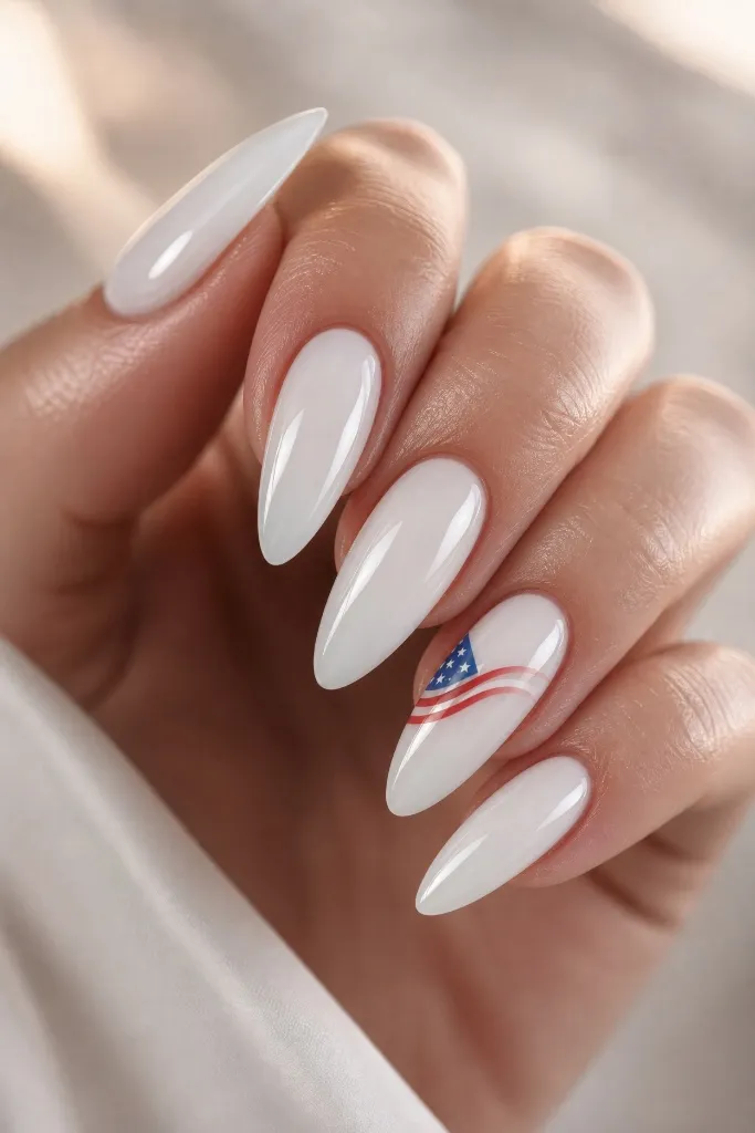 4th of July Nails for 2026 Milky White Almond Nails With Subtle Flag Accent