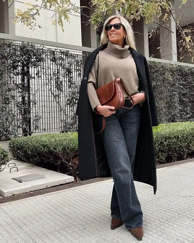What to Wear This Fall 2026 Over 50 Taupe Turtleneck With Black Coat and Flare Jeans