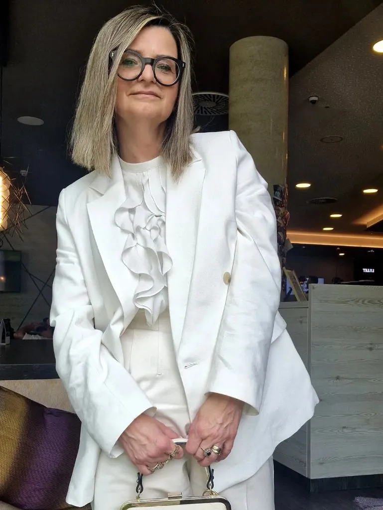 What to Wear This Fall 2026 Over 50 All-White Ruffle Blazer For Polished Evenings