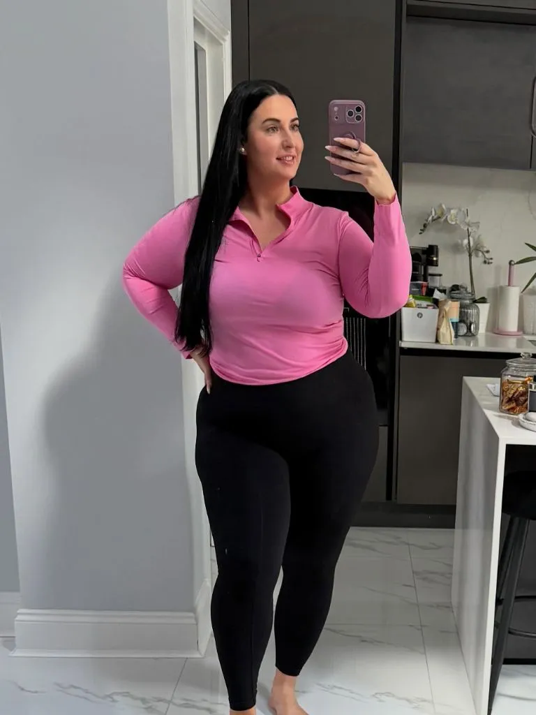 Fall Outfits for Plus Size Women 2026 Pink Quarter-Zip With High-Waist Black Leggings