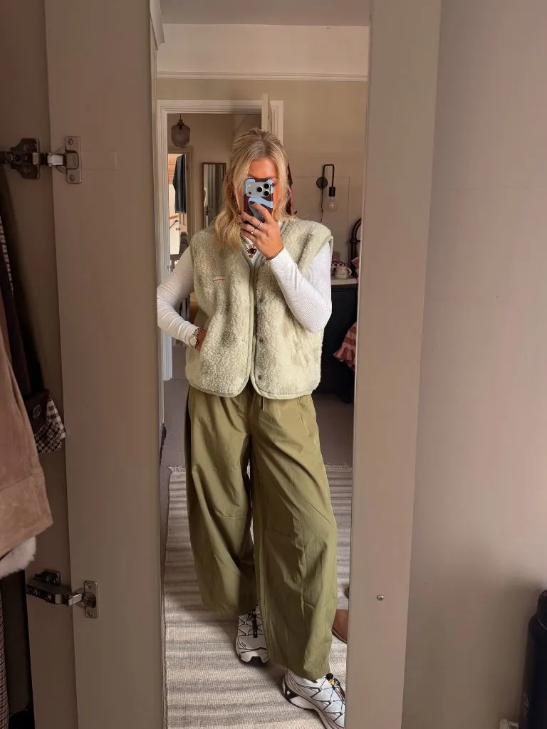 Fall Outfits with Sweater 2026 Olive Sherpa Vest Over a Long-Sleeve Base