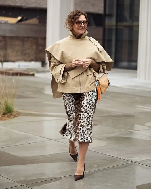 What to Wear This Fall 2026 Over 50 Khaki Cape Jacket With Leopard Print Midi