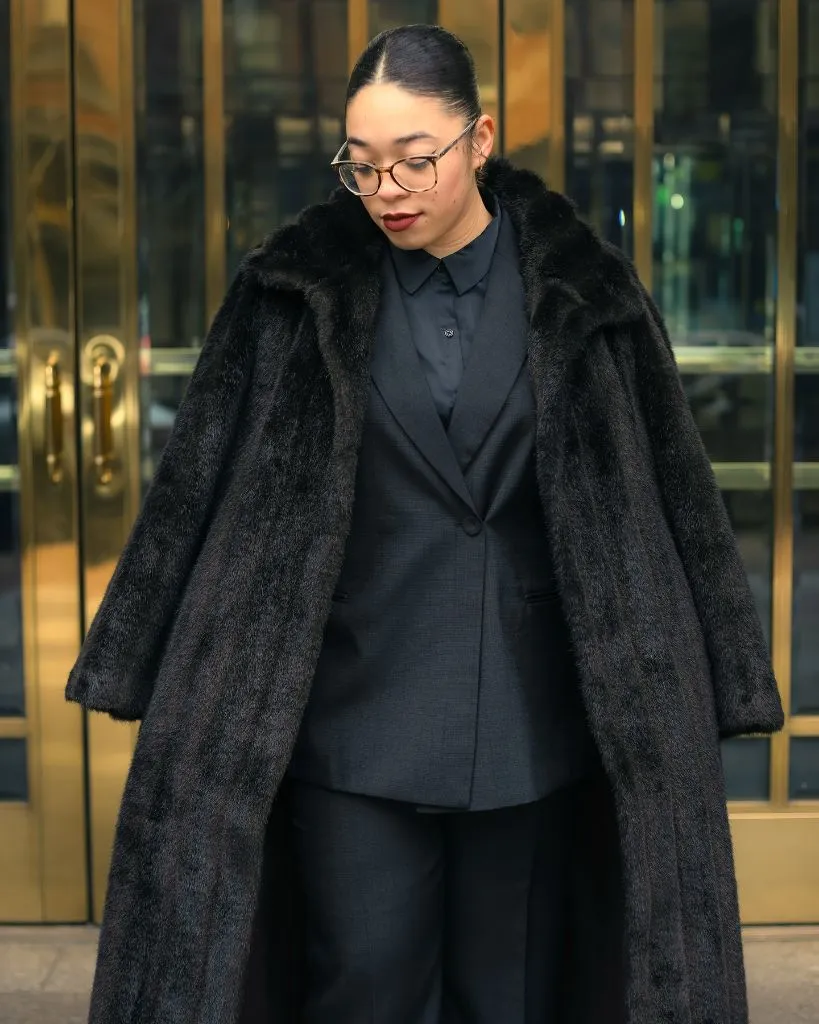 Fall Outfits for Black Women in 2026 All-Black Suit With Faux Fur Overcoat for Power Dressing
