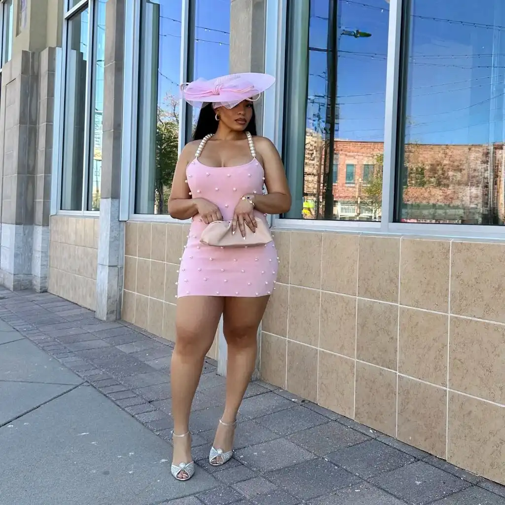 Fall Outfits for Black Women in 2026 Pink Pearl-Embellished Mini Dress With Fascinator for Special Occasions