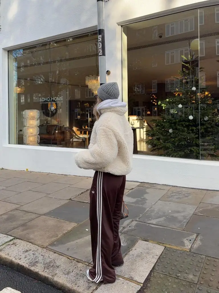 Fall Outfits with Sweater 2026 Cream Sherpa Jacket Over Burgundy Track Pants