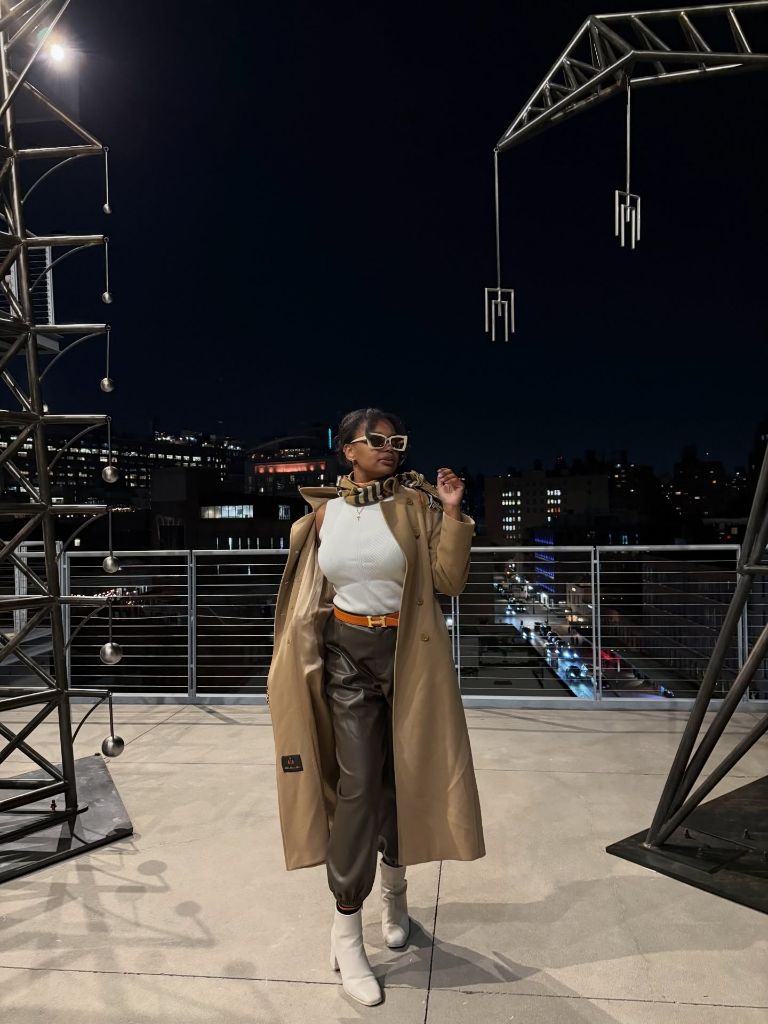 Fall Outfits for Black Women in 2026 Camel Trench With Leather Trousers for a Rooftop Evening