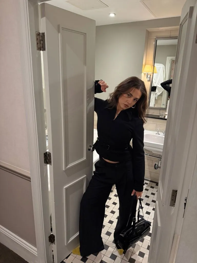 Fall Date Night Outfits 2026 Belted Black Knit Set With Wide Trousers for Quiet Confidence
