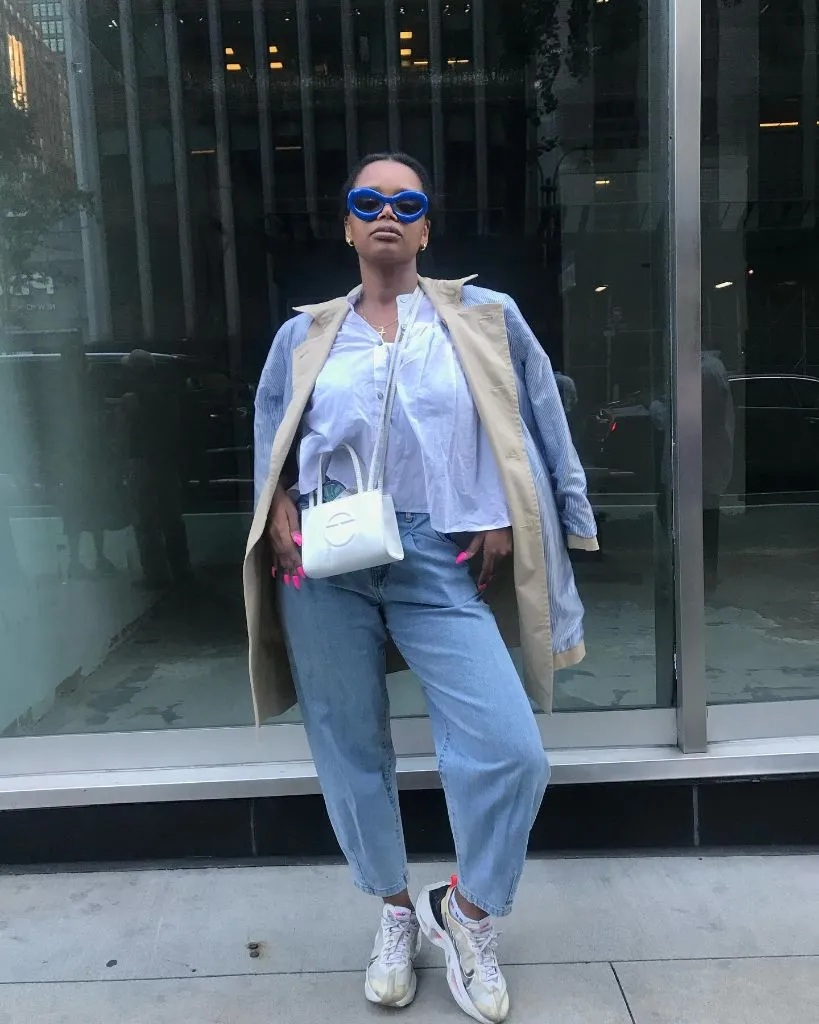 Fall Outfits for Black Women in 2026 Layered Blue Button-Down With Relaxed Jeans for a City Walk