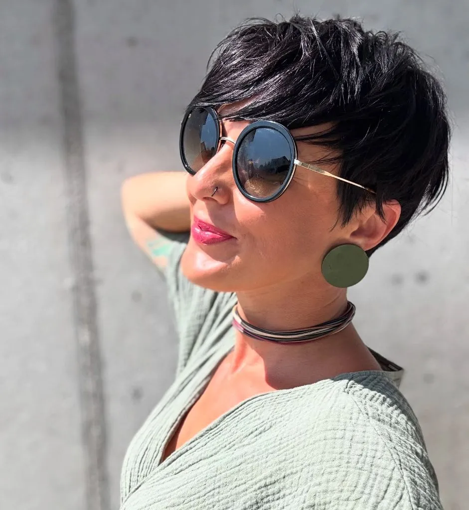 Fall Hairstyles for Short Hair 2026 Feathered Black Pixie with Wispy Side Fringe