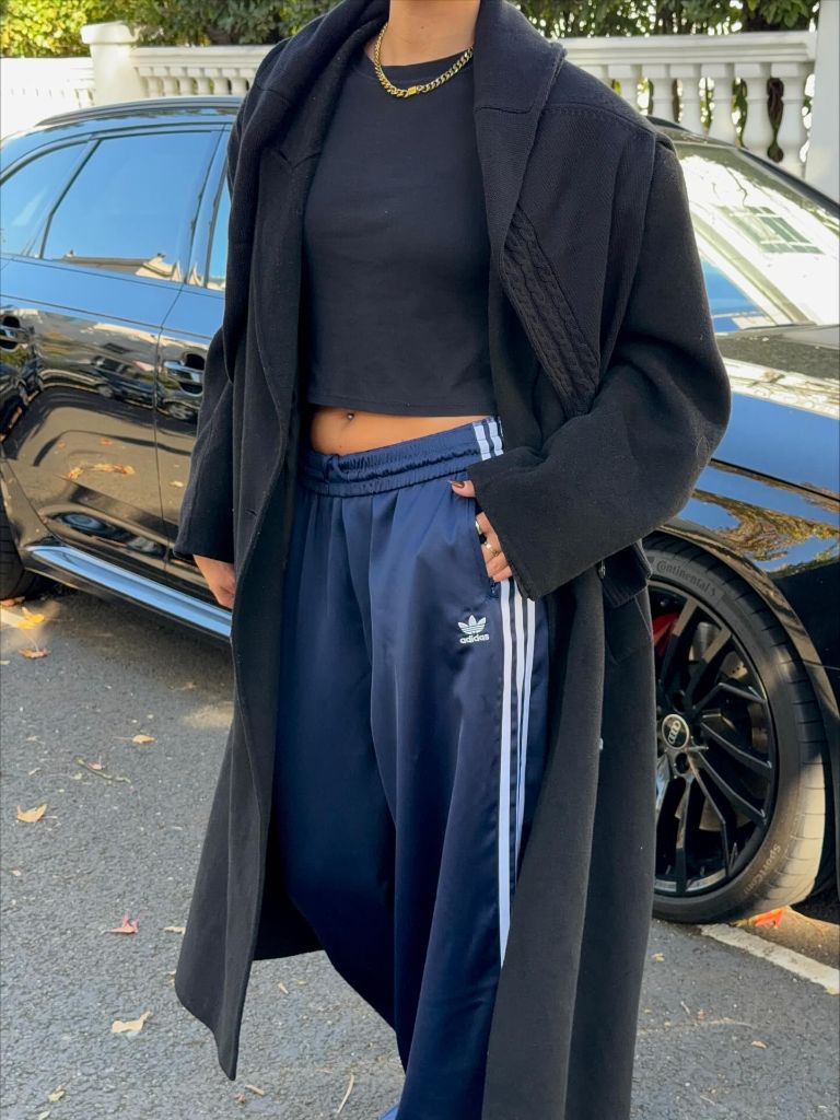 What Are the Best Fall Outfits for Casual Days 2026 Black Maxi Coat Over Adidas Track Pants