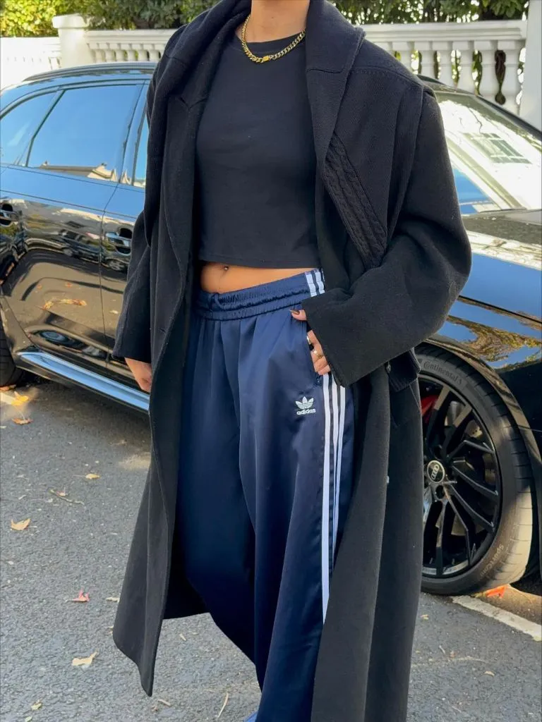 What Are the Best Fall Outfits for Casual Days 2026 Black Maxi Coat Over Adidas Track Pants