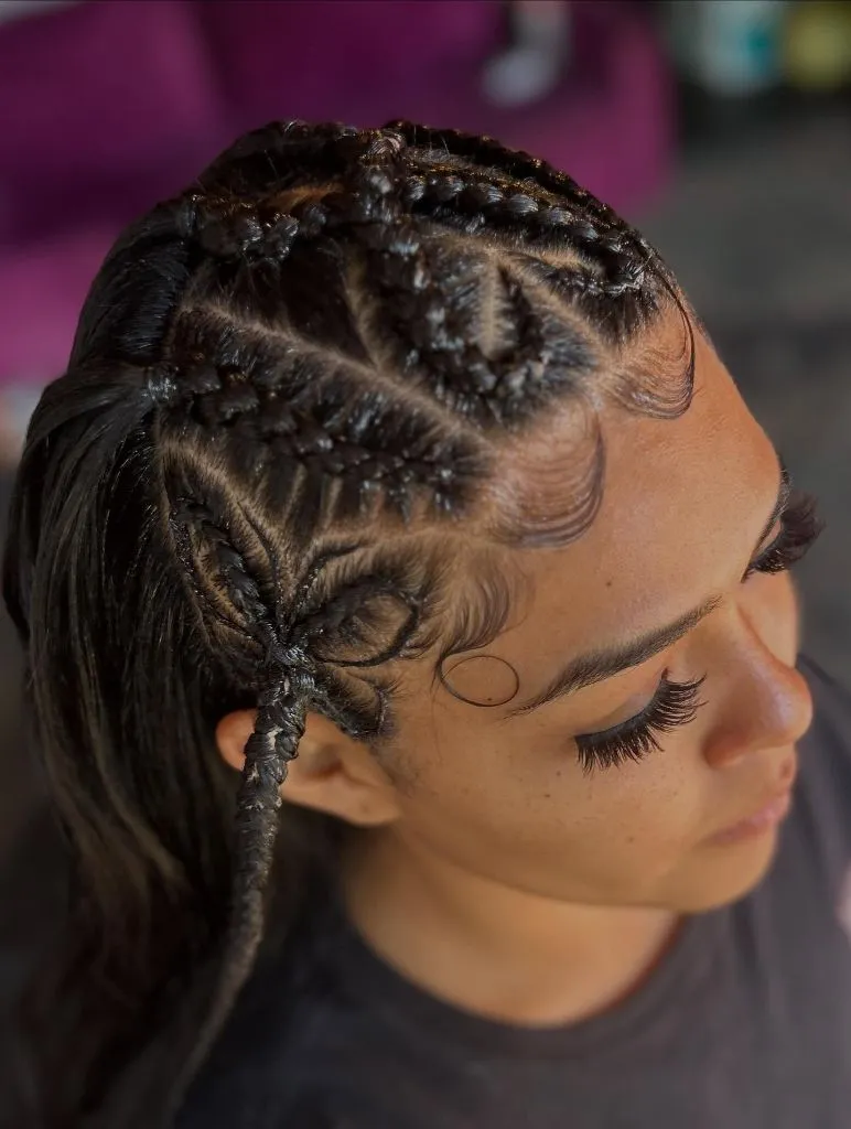 Butterfly Braids Hairstyle 2026 Intricate Floral Cornrow Design with Artistic Parting