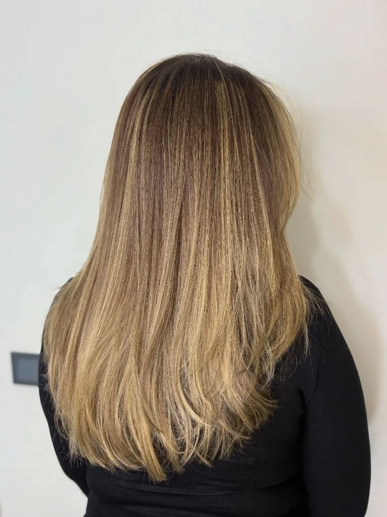 Fall Haircuts for Women 2026 Warm Bronde Straight Layers With A Soft Gradient