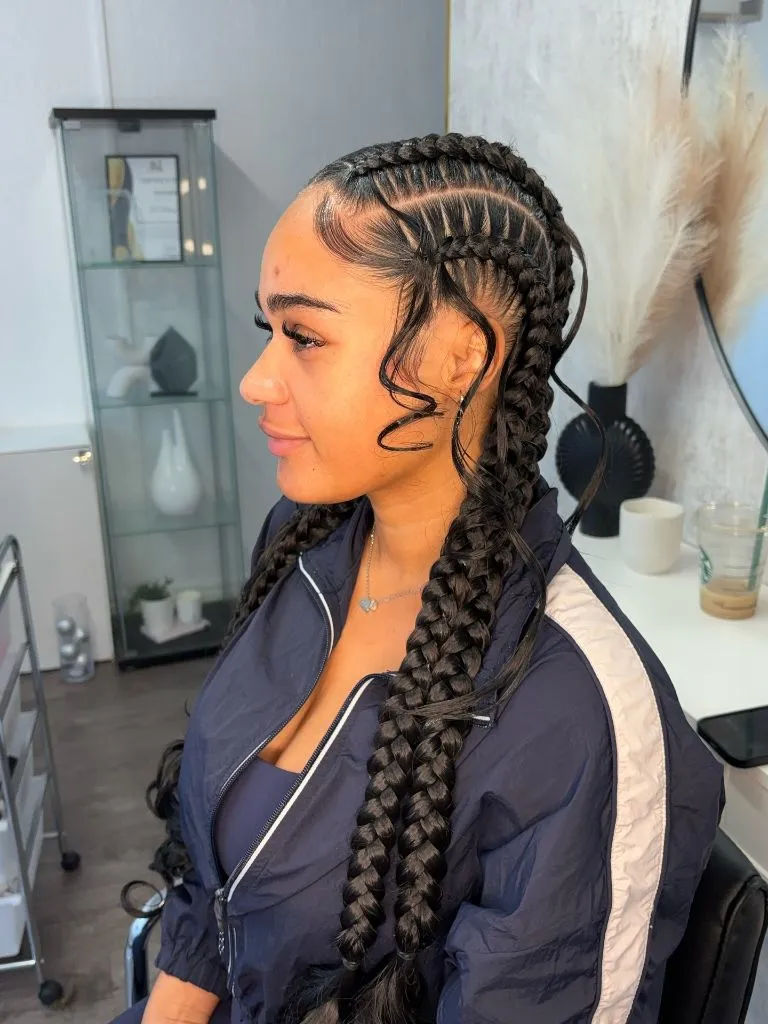 Butterfly Braids Hairstyle 2026 Two Feed-In Butterfly Braids with Classic Elegance
