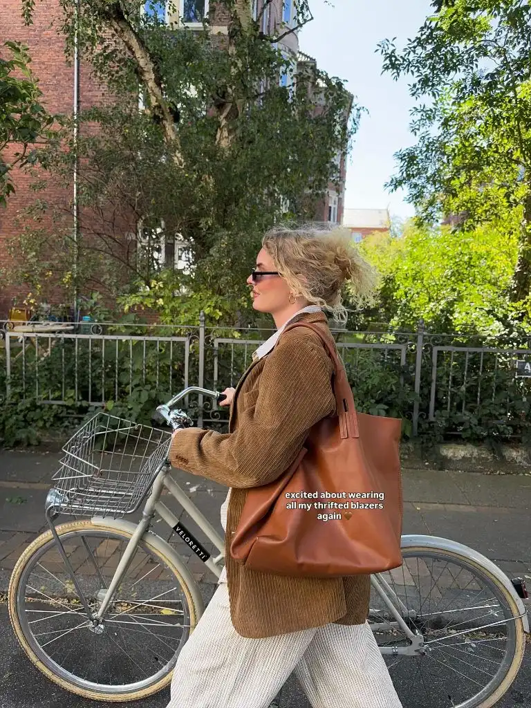 August Outfits 2026 Tan Corduroy Blazer With Cream Trousers and Leather Tote for Biking