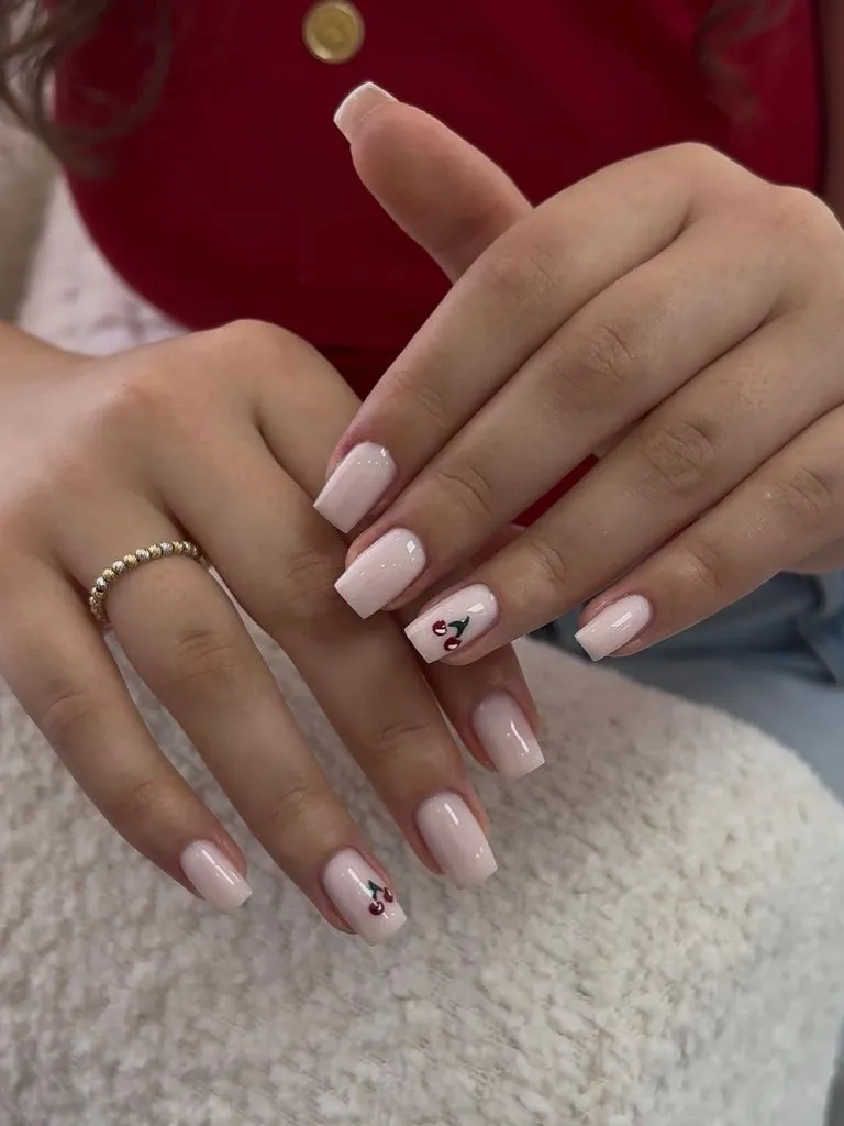 August Nails Ideas 2026 Nude Square Nails With Tiny Cherry Art for Subtle Charm