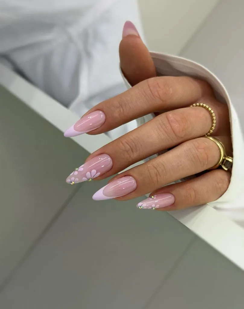 August Nails Ideas 2026 Soft Pink French Almond Nails With Daisy Accents