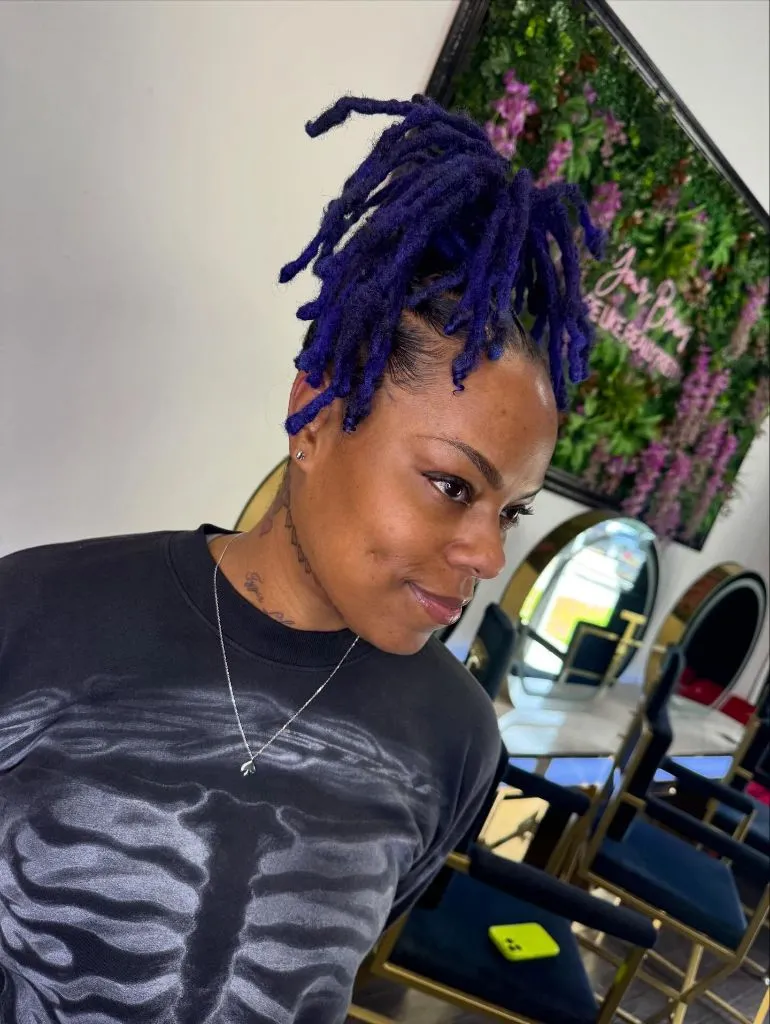 Locs Hairstyles for Black Women 2026 Purple Locs Updo with Playful Pineapple Lift