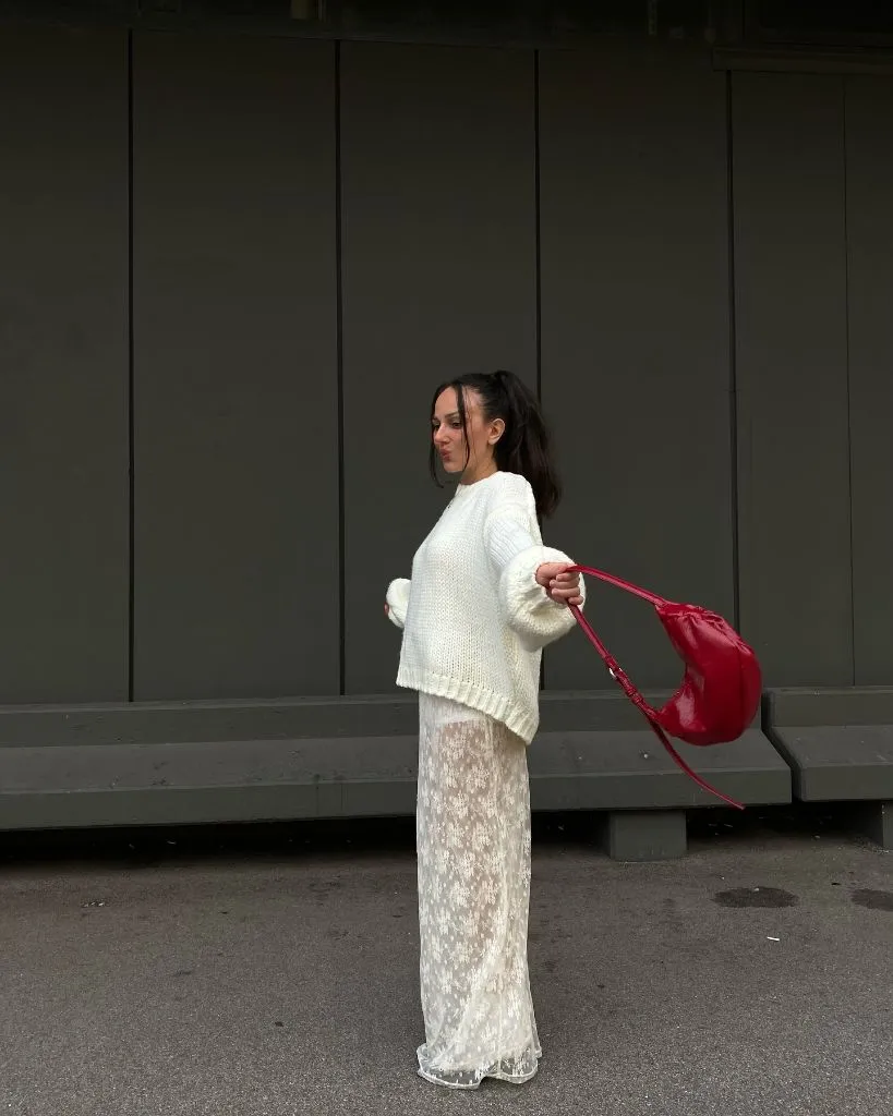 Early Fall Outfits 2026 White Chunky Knit With Sheer Lace Pants and Red Bag