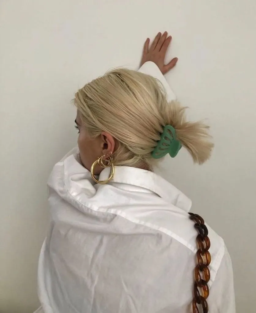 Fall Hairstyles for Office 2026 Playful Short Claw Clip Tuck with Blonde Texture