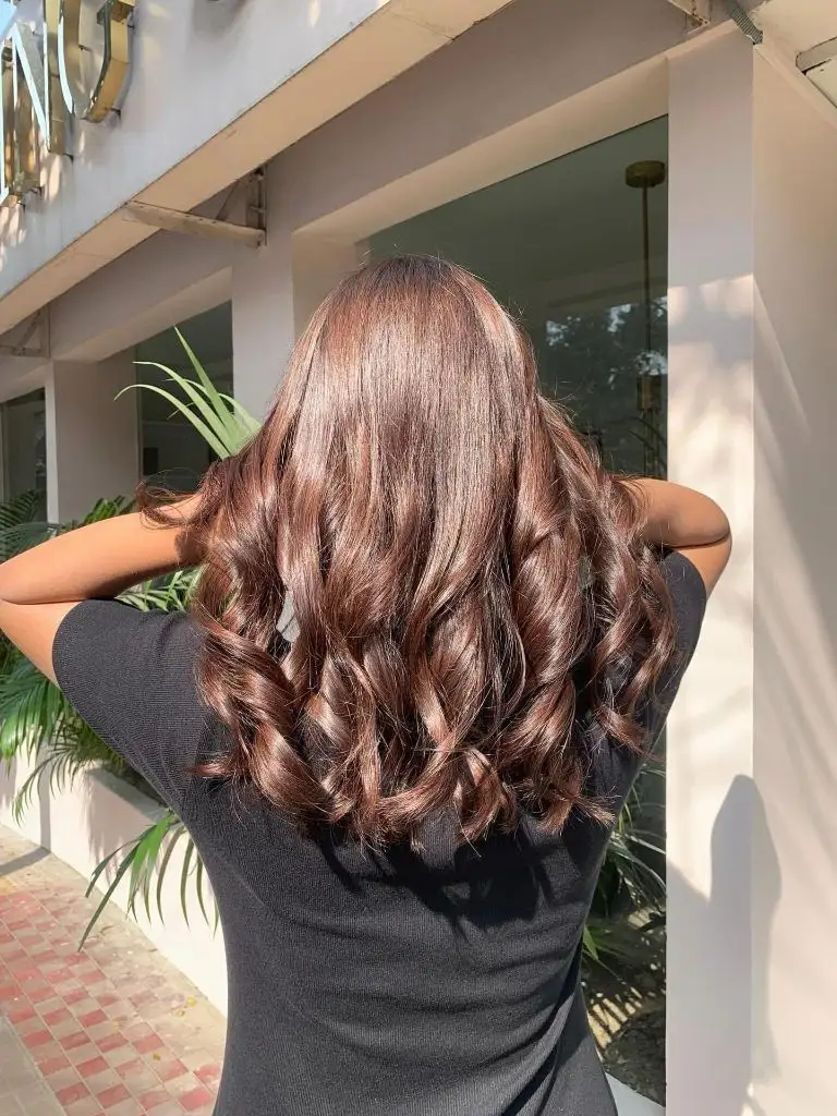 Fall Medium Haircuts 2026 Glossy Chestnut Curls With Warm Undertones and Body