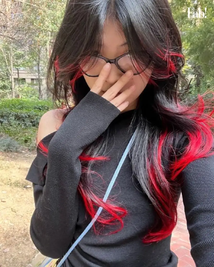 August Hairstyles And Color Ideas 2026 Crimson Red Underlayer Peeking Through Black For A Vampy Edge