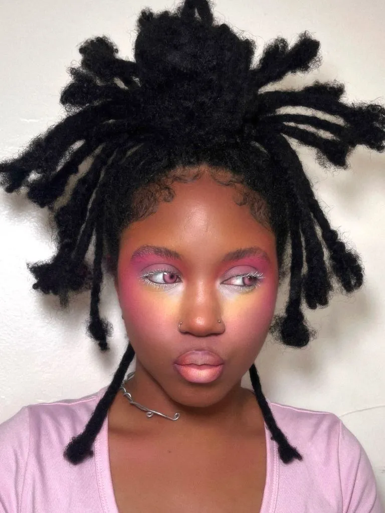Locs Hairstyles for Black Women 2026 Spiky Loc Puff with Artistic Freestyle Texture
