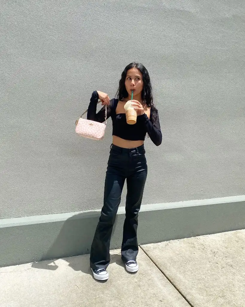 Nice Fall Outfits 2026 Black Long-Sleeve Crop and Flare Jeans With a Pink Crossbody