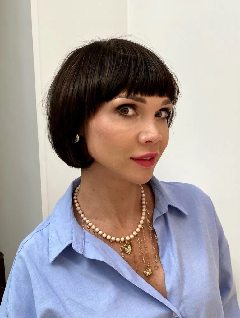 Fall Short Haircuts 2026 Classic French Bob With Full Bangs And A Dark Chocolate Tone