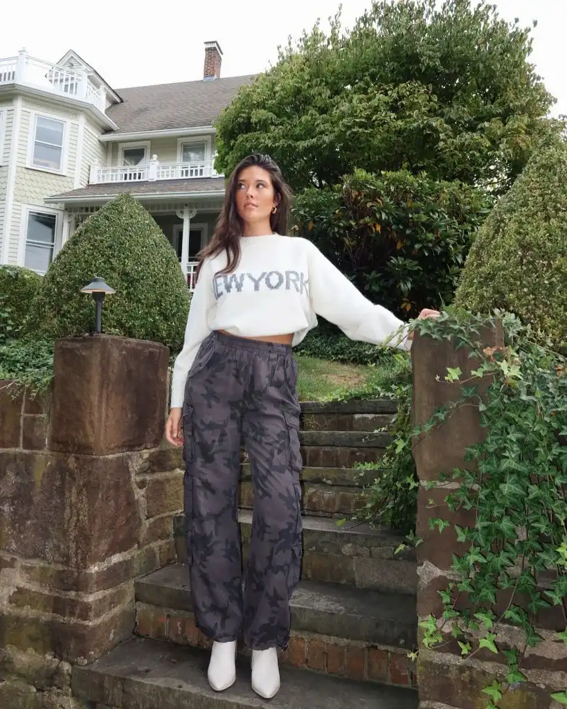 Comfy Fall Outfits 2026 New York Sweater and Camo Cargo Pants for an Edgy Mix