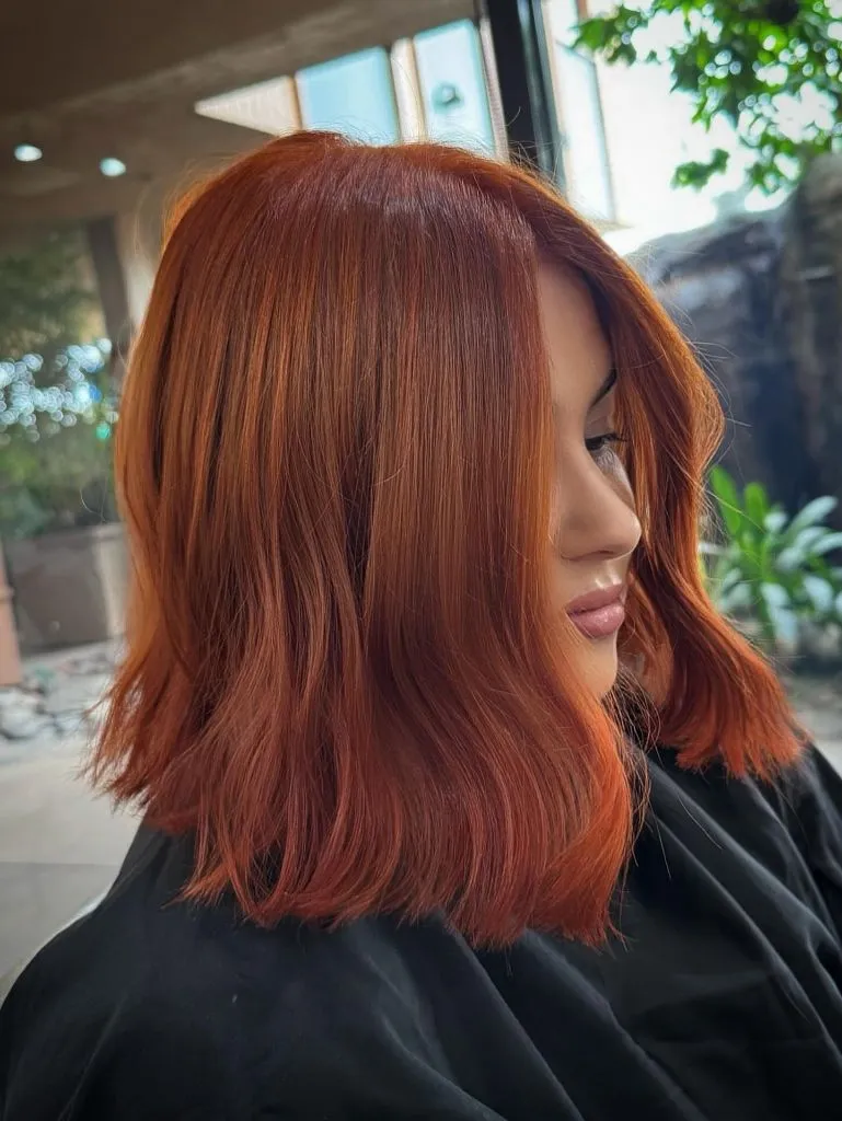 Fall Hairstyles 2026 Bright Copper Orange Bob for a Short, Bold Fall Color Moment