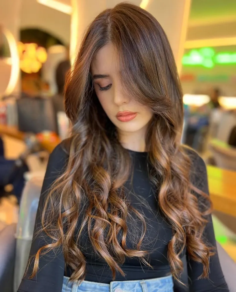 Fall Brunette Hair Colour 2026 Cinnamon Caramel Brunette with Long Cascading Curls