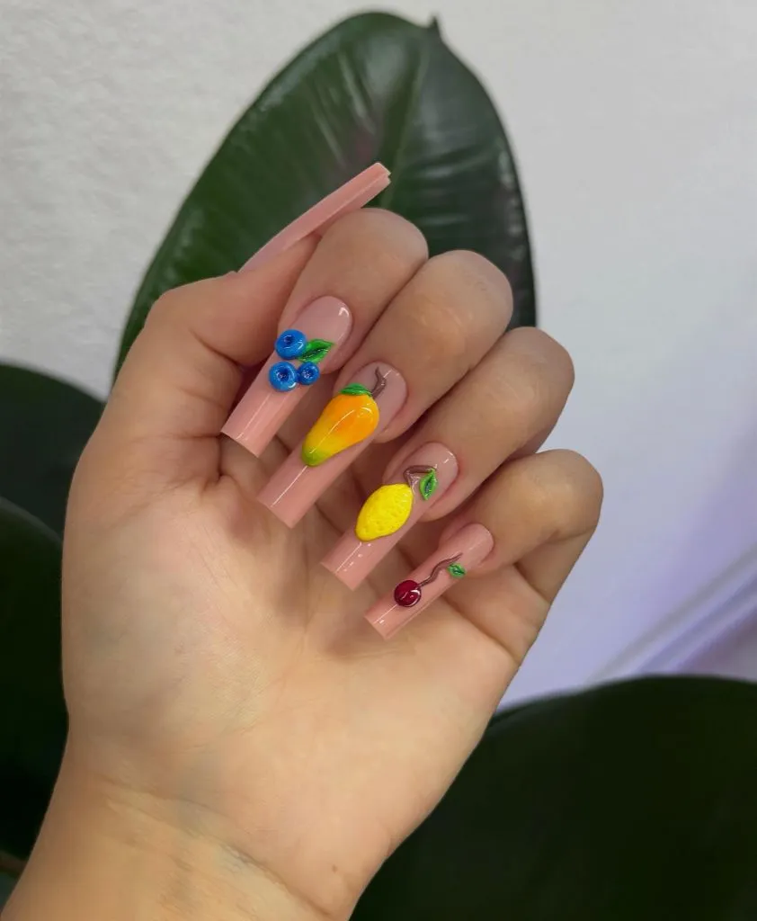 August Nails Ideas 2026 3D Fruit Art on Nude Pink Coffin Nails for a Tropical August Mood