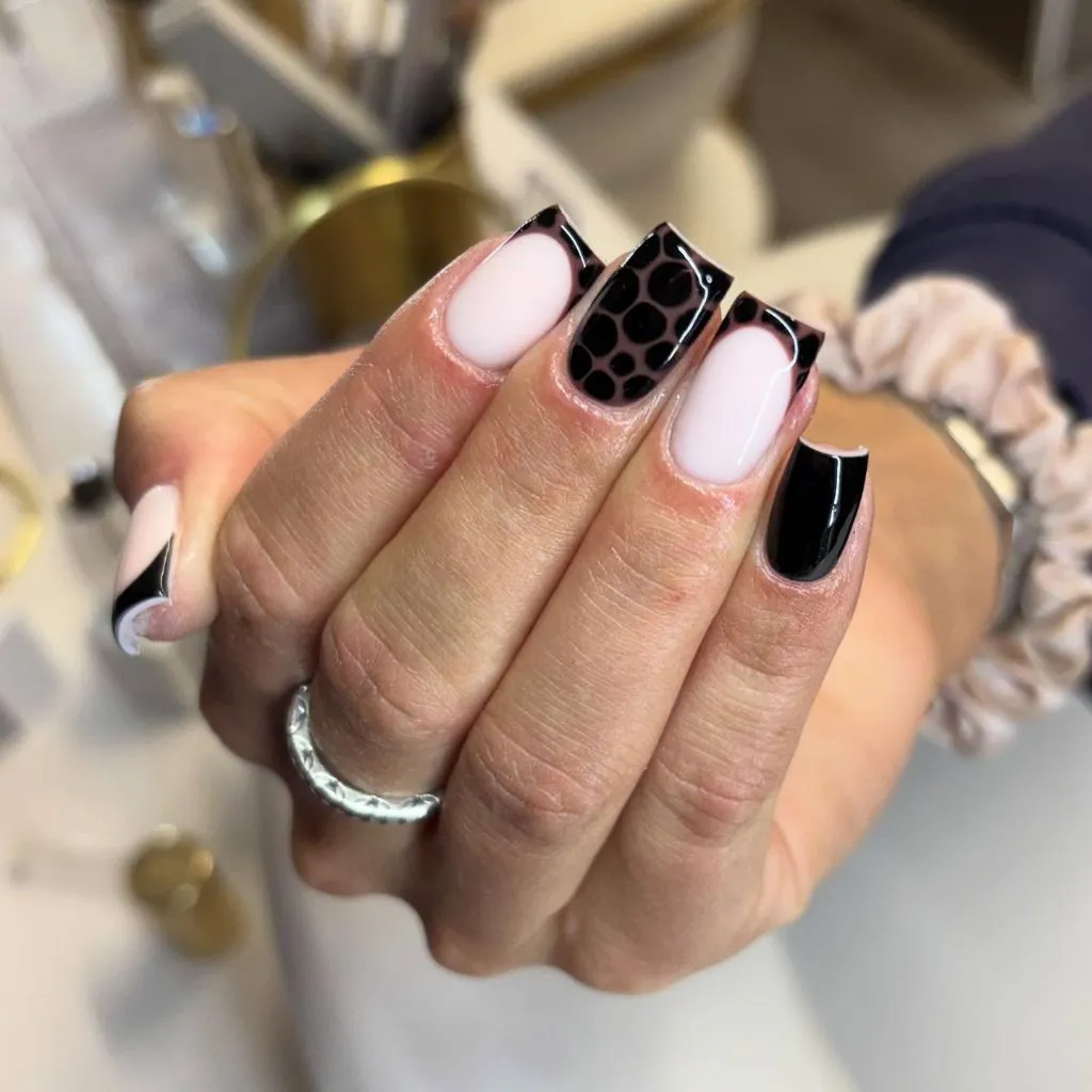 August Nails Ideas 2026 Black-and-Pink Square Nails With Snake-Print Accent