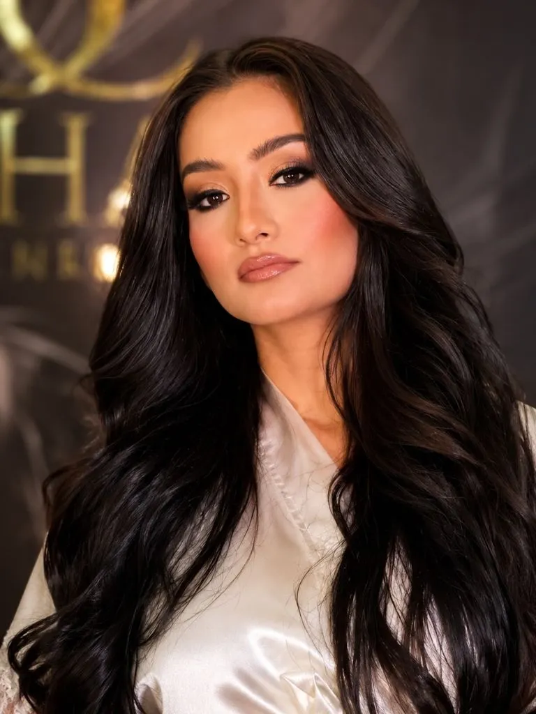 Fall Medium Haircuts 2026 Glamorous Black Waves With a Dramatic Side Sweep