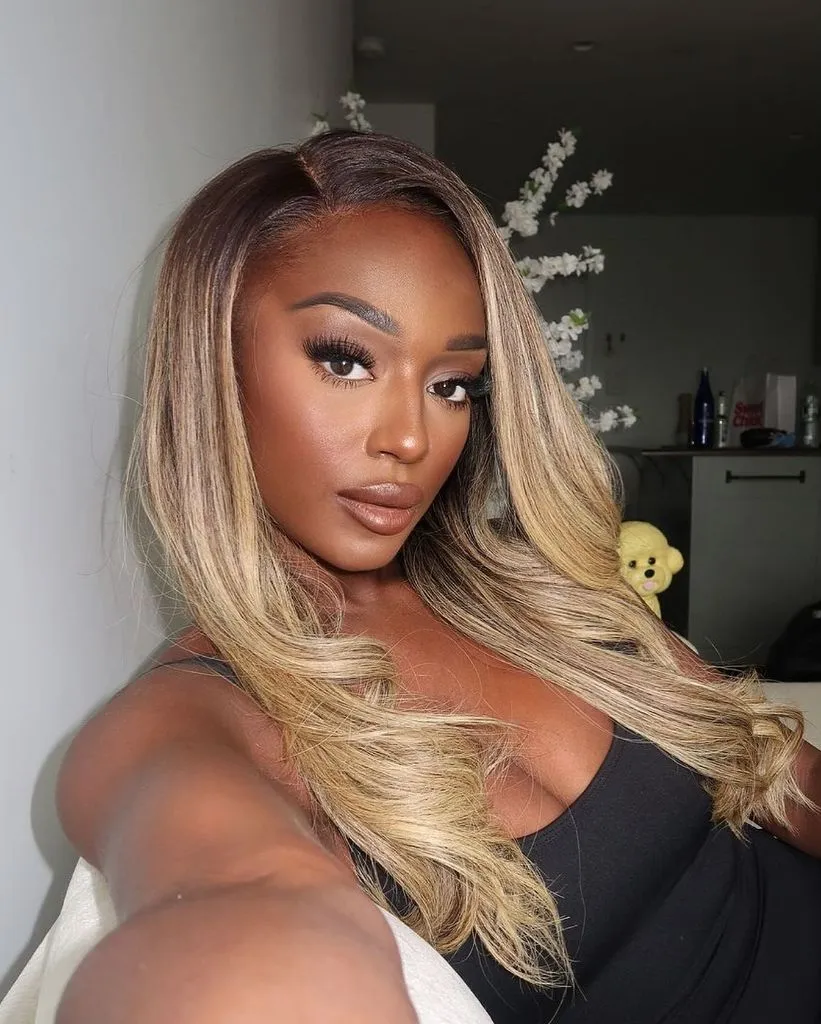 Fall Hair Colors for Black Women 2026 Warm Blonde Ombre on Long Waves