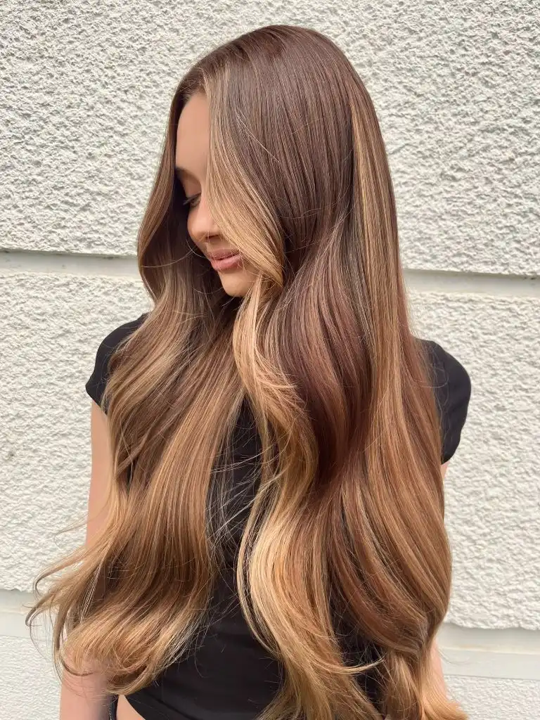 Fall Hairstyles for Long Hair 2026 Glossy Copper-Caramel Melt on Extra-Long Layers