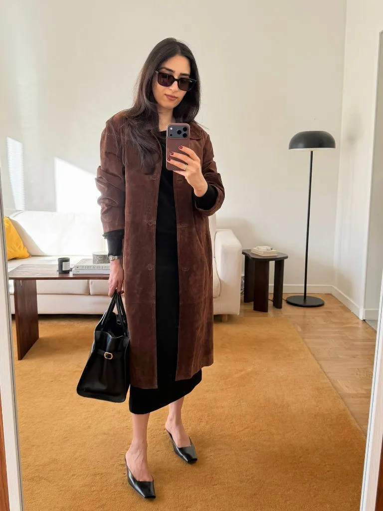 Midi Skirt Fall Outfit 2026 Brown Suede Coat Over Black Midi Dress With Pointed Mules
