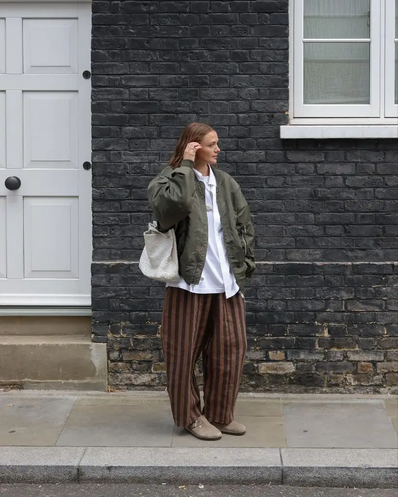 What Are the Best Fall Outfits for Casual Days 2026 Green Bomber Over Striped Wide Trousers