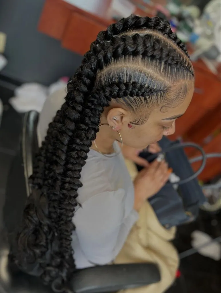 Butterfly Braids Hairstyle 2026 Two Jumbo Butterfly Braids with Textured Ponytail Flow