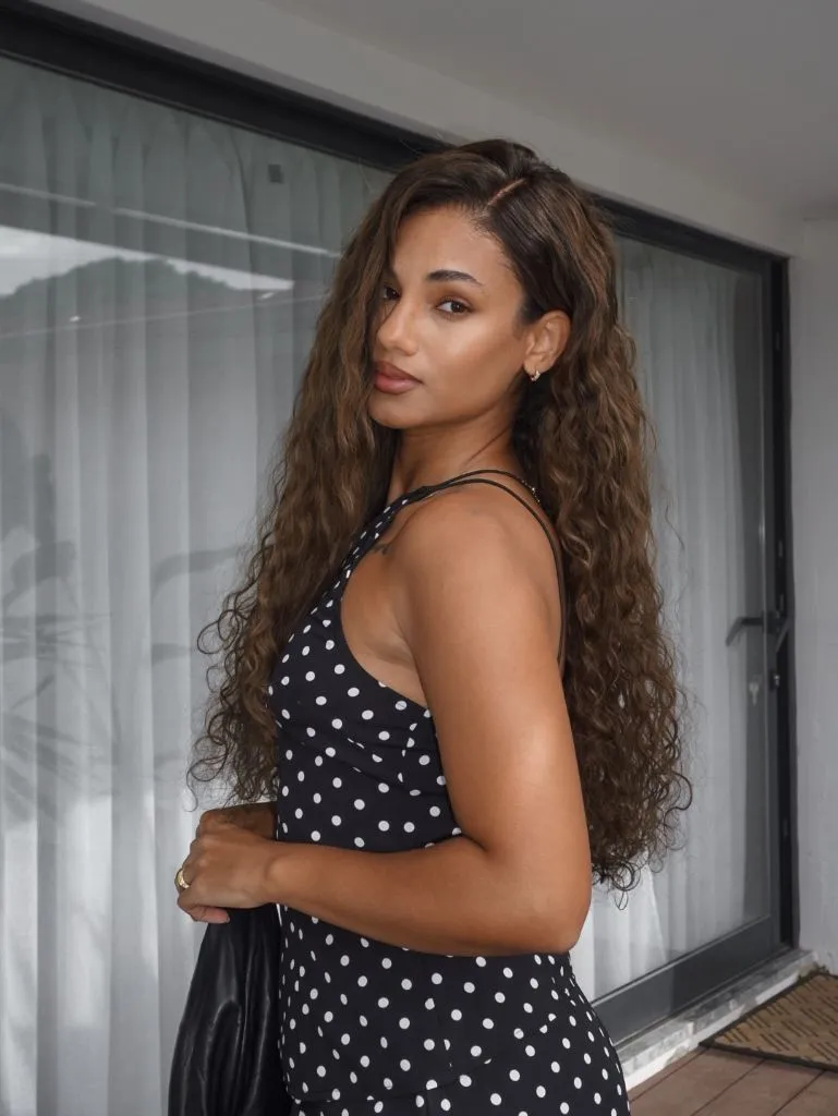 Fall Hair Colors for Black Women 2026 Long Curly Half-Up with Polka Dot Dress