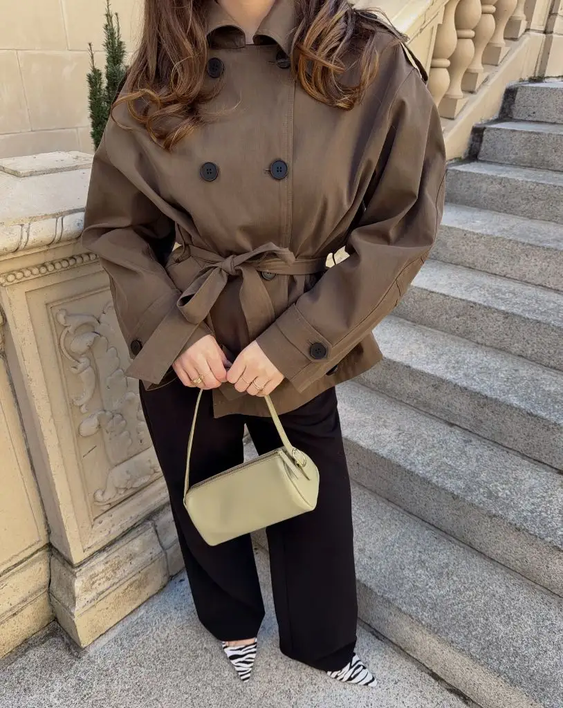 Fall Outfits With Peacoat 2026 Dark Brown Belted Peacoat With Zebra Mules and Sage Green Bag