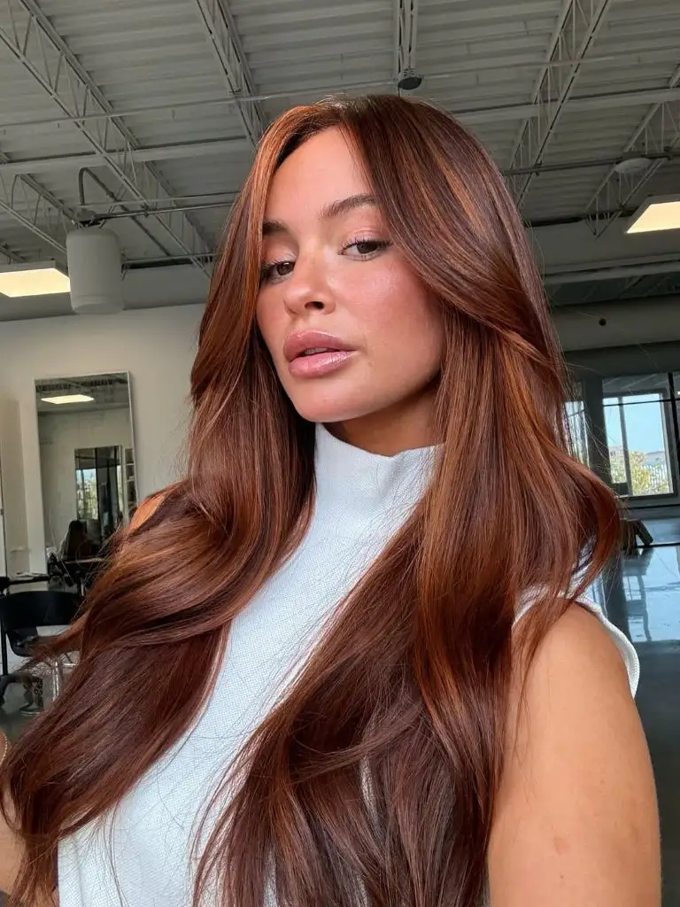 Fall Hairstyles 2026 Rich Auburn Copper with Soft Curtain Layers That Catch Light