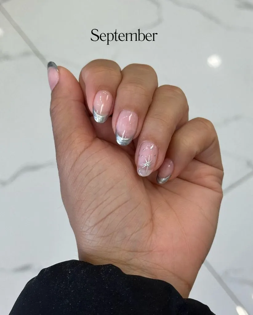 August Nails Color 2026 Silver Chrome French Tips With Starburst Detail for an Elegant September-Crossover Set