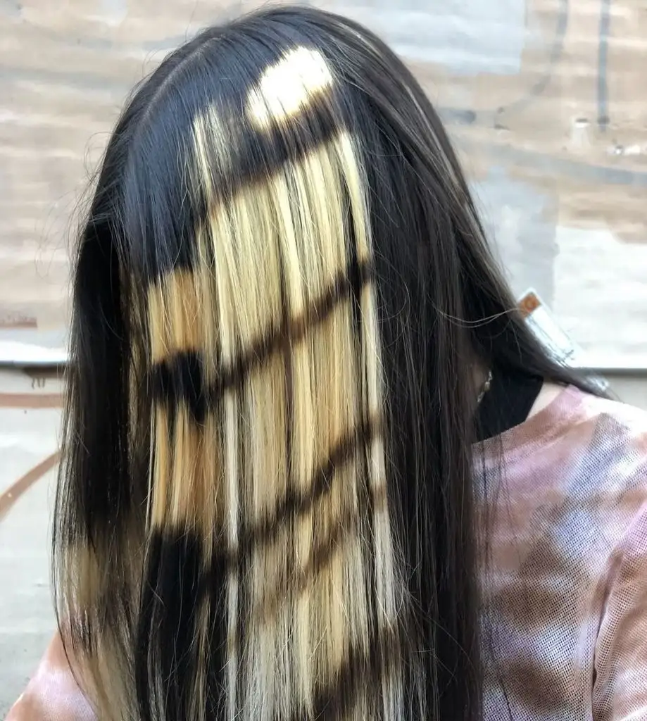 August Hairstyles And Color Ideas 2026 Bleached Peekaboo Panels Under Jet Black For A Bold Reveal