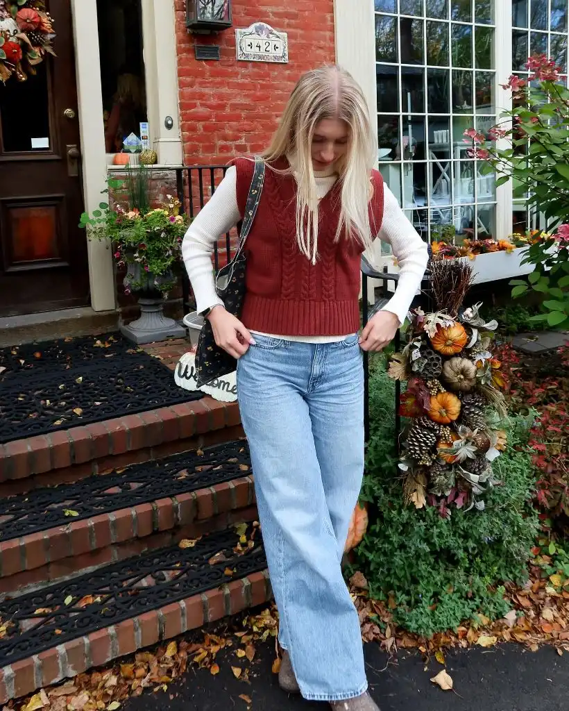 Wide Leg Jeans Outfit Fall 2026 Burgundy Sweater Vest With Light Wash Wide Leg Denim