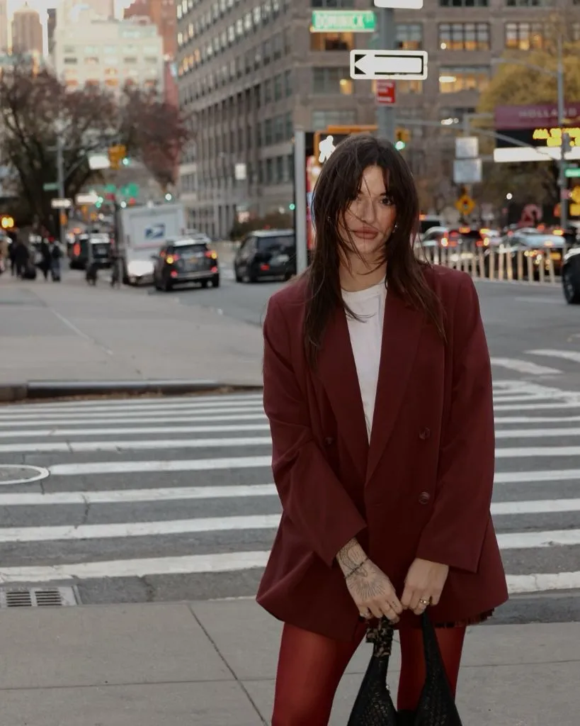 Early Fall Outfits 2026 Burgundy Oversized Blazer With Red Tights for City Nights