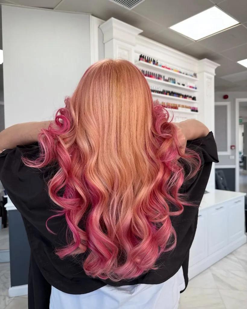 Fall Hair Colour Ideas 2026 Peachy Strawberry Blonde with Pink-Tipped Curls for a Playful Fall