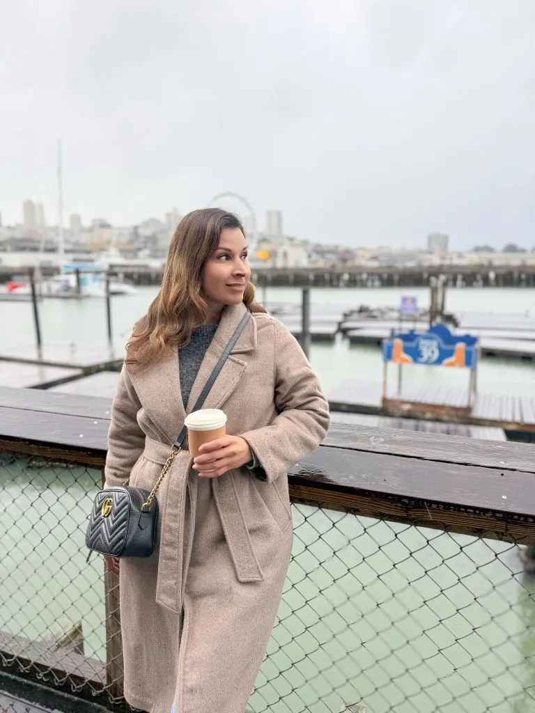 Fall Sweater Dress Outfits 2026 Oatmeal Wrap Coat Over a Knit Midi for Waterfront Days
